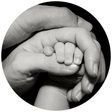 Emotional support for families. Father, mother and baby holding hands.